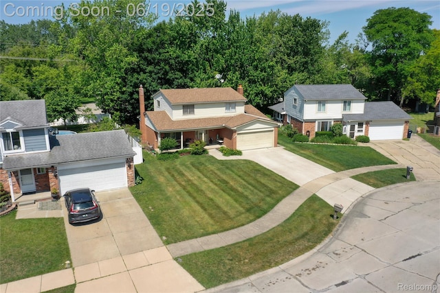 38247 Forsdale Dr, Sterling Heights, MI 48310 - view of front of property featuring brick siding, driveway, a front yard, and covered porch