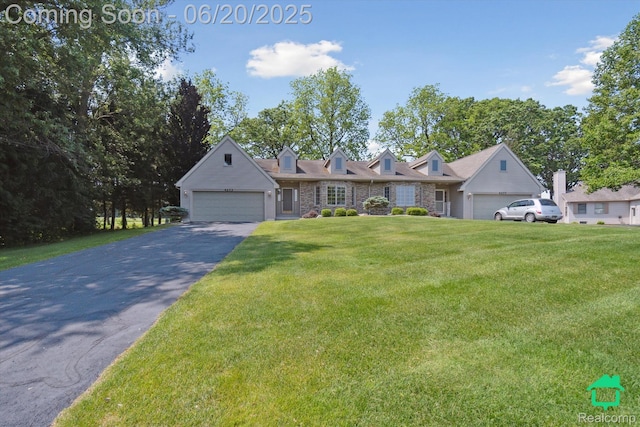4273 Fairway Ln, Jackson, MI 49201 - cape cod home with a front lawn