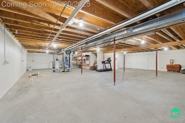 4273 Fairway Ln, Jackson, MI 49201 - unfinished below grade area with heating unit and gas water heater