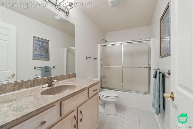 4273 Fairway Ln, Jackson, MI 49201 - full bathroom with vanity, tile patterned flooring, and bath / shower combo with glass door