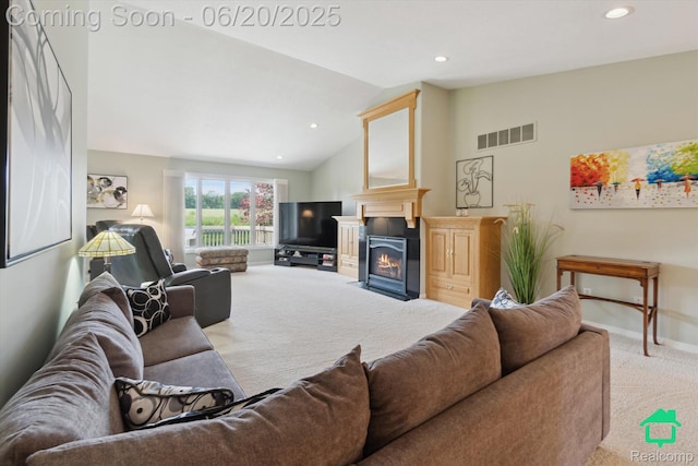 4273 Fairway Ln, Jackson, MI 49201 - living area featuring light colored carpet, a fireplace with flush hearth, recessed lighting, and high vaulted ceiling