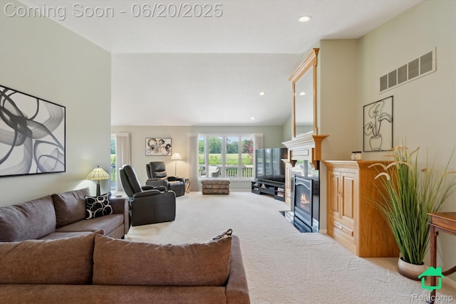 4273 Fairway Ln, Jackson, MI 49201 - living area with carpet, a fireplace with flush hearth, and recessed lighting