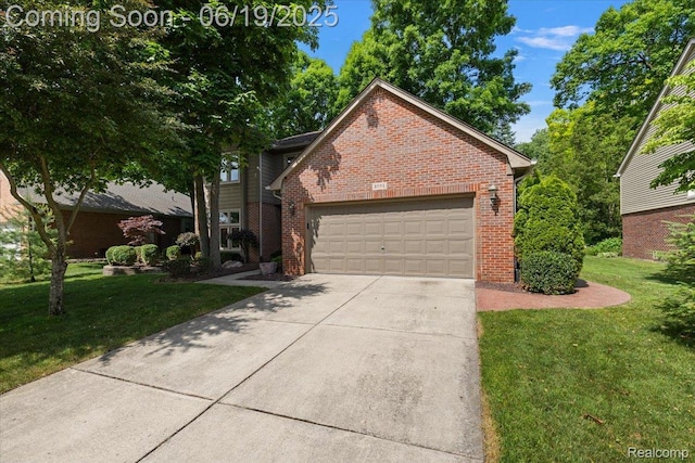 2082 Avon Lake Ln, Rochester Hills, MI 48307 - traditional-style home with brick siding, an attached garage, a front lawn, and concrete driveway