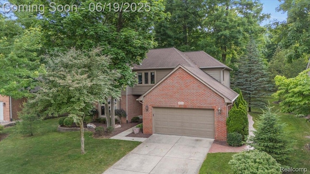 2082 Avon Lake Ln, Rochester Hills, MI 48307 - view of front facade featuring brick siding, driveway, a front lawn, and a garage