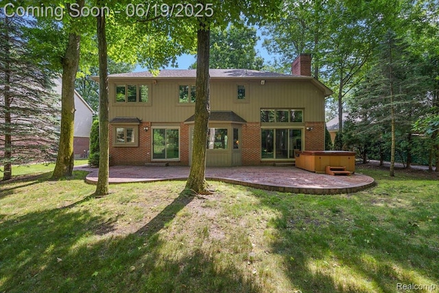 2082 Avon Lake Ln, Rochester Hills, MI 48307 - rear view of house featuring a hot tub, a chimney, a patio area, and brick siding