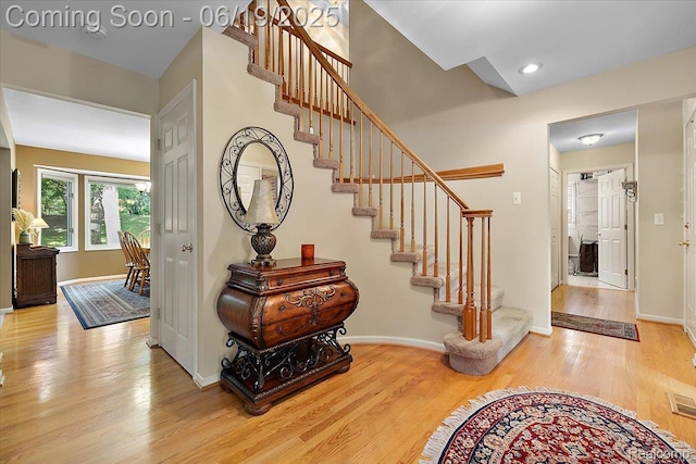 2082 Avon Lake Ln, Rochester Hills, MI 48307 - stairway with wood finished floors and recessed lighting