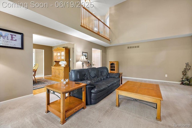 2082 Avon Lake Ln, Rochester Hills, MI 48307 - living area with carpet and a high ceiling