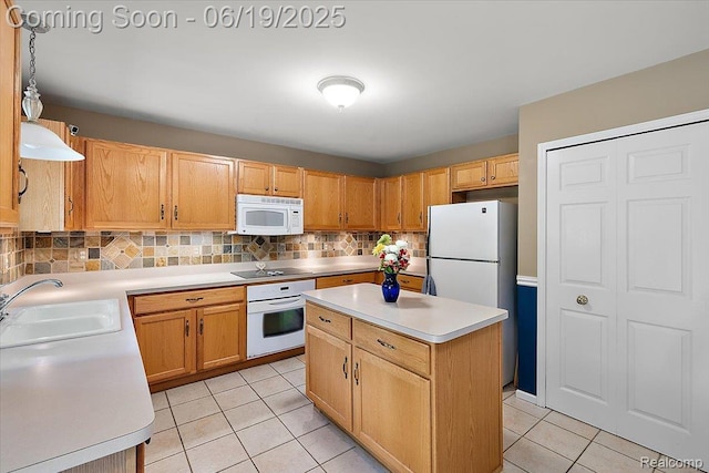 2082 Avon Lake Ln, Rochester Hills, MI 48307 - kitchen featuring white appliances, light tile patterned floors, light countertops, backsplash, and a center island