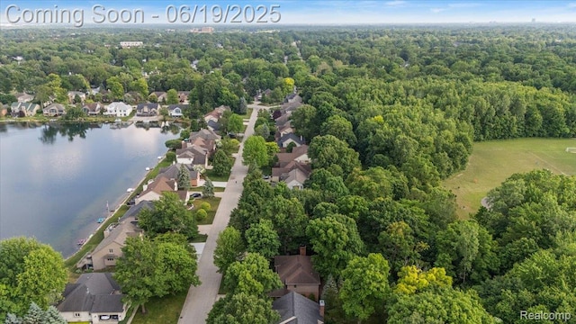 2082 Avon Lake Ln, Rochester Hills, MI 48307 - aerial view of property and surrounding area with nearby suburban area and a forest