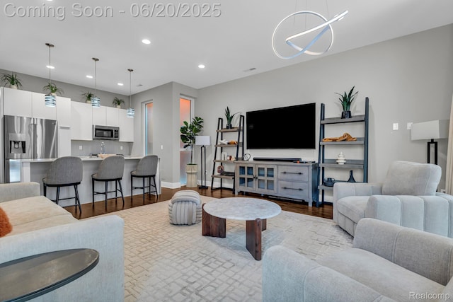 2648 John R St, Detroit, MI 48201 - living room with recessed lighting and wood finished floors