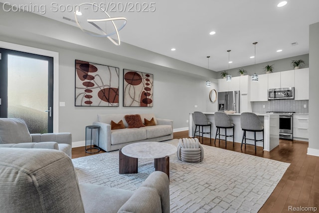 2648 John R St, Detroit, MI 48201 - living area with recessed lighting and dark wood-type flooring