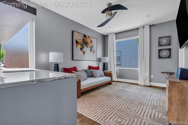 2648 John R St, Detroit, MI 48201 - living area featuring wood finished floors and a ceiling fan