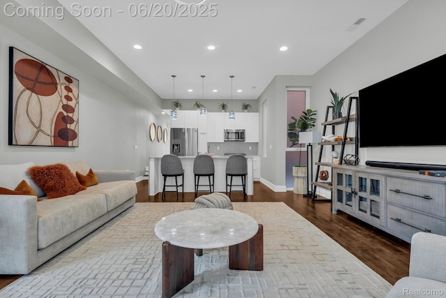 2648 John R St, Detroit, MI 48201 - living room with recessed lighting and dark wood-style flooring