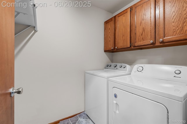 2206 Estates Dr, Highland, MI 48357 - washroom with cabinet space and independent washer and dryer