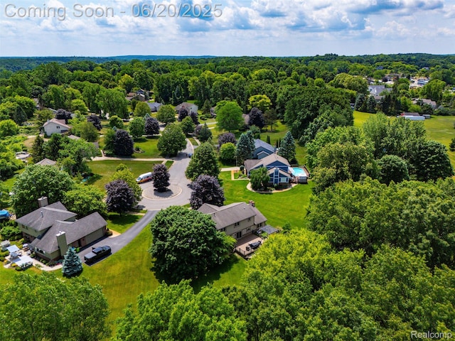 2206 Estates Dr, Highland, MI 48357 - aerial view of a heavily wooded area