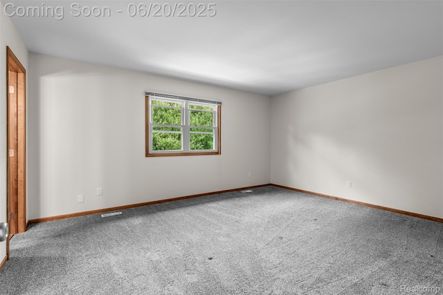 2206 Estates Dr, Highland, MI 48357 - empty room featuring carpet floors