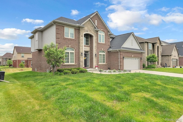 50432 Maywood, Dearborn, MI 48188 - view of front of house with brick siding, a front lawn, driveway, an attached garage, and a residential view