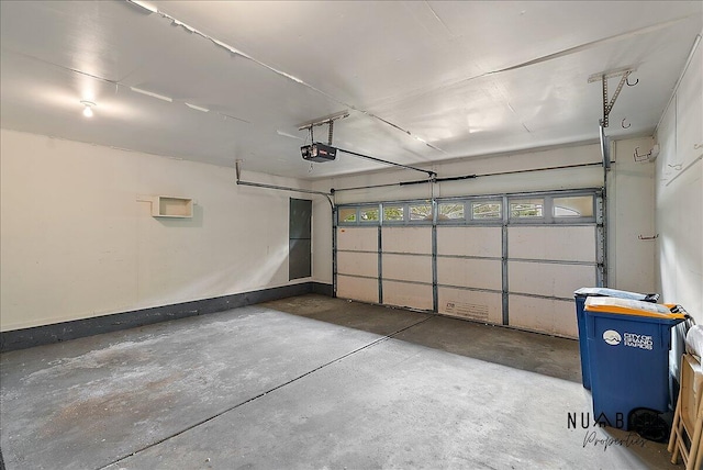1427 Atlantic St NW, Grand Rapids, MI 49504 - garage with a garage door opener
