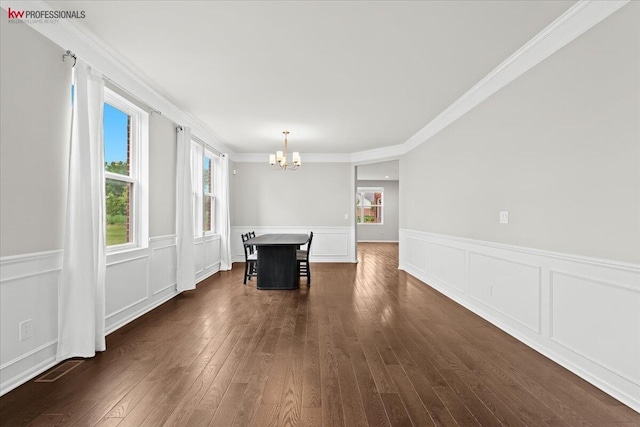 945 Reef Dr, Canton, MI 48187 - unfurnished dining area featuring a chandelier, crown molding, dark wood finished floors, and wainscoting