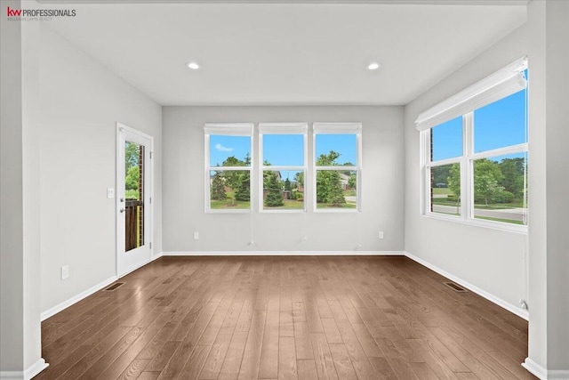 945 Reef Dr, Canton, MI 48187 - unfurnished room with dark wood finished floors and recessed lighting