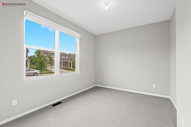 945 Reef Dr, Canton, MI 48187 - empty room featuring carpet flooring and baseboards