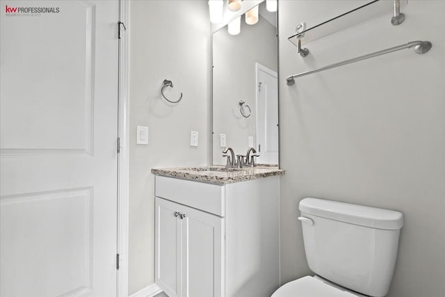 945 Reef Dr, Canton, MI 48187 - bathroom featuring vanity and toilet