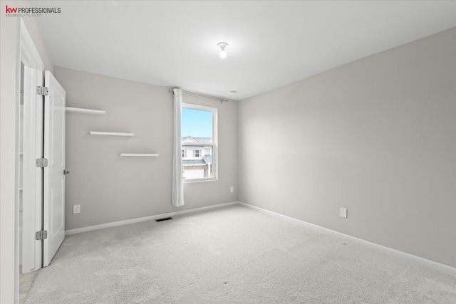 945 Reef Dr, Canton, MI 48187 - unfurnished bedroom with light carpet and baseboards