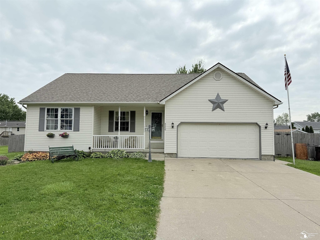 3260 Sixth St, Monroe, MI 48162 - single story home featuring a porch, driveway, a shingled roof, and a garage