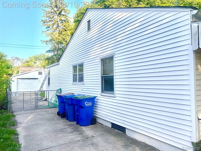 20760 Atlantic Ave, Warren, MI 48091 - view of side of home with a gate