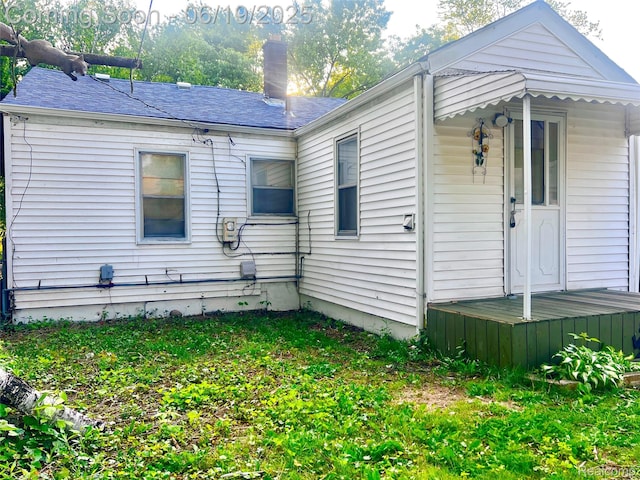 20760 Atlantic Ave, Warren, MI 48091 - view of home's exterior with a chimney