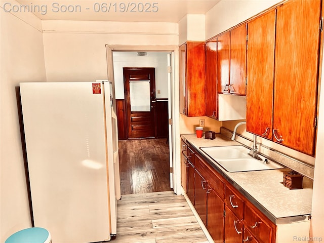20760 Atlantic Ave, Warren, MI 48091 - kitchen featuring freestanding refrigerator and light wood-style flooring