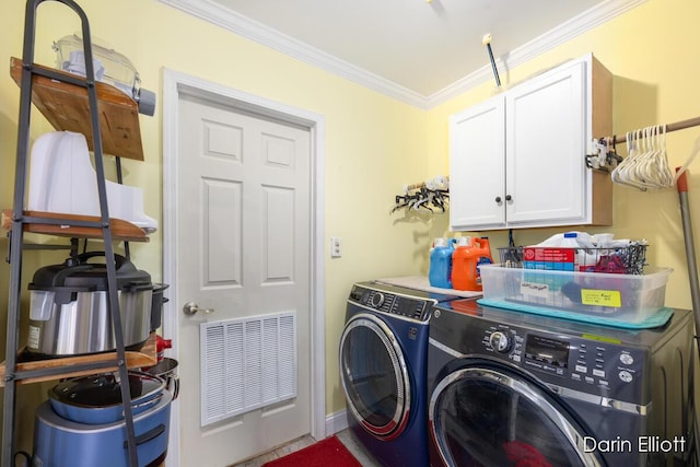 204 Maple St, Durand, MI 48429 - laundry area featuring washing machine and clothes dryer, cabinet space, and ornamental molding