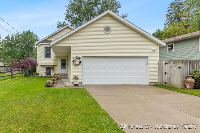 1300 Lancaster Ave NW, Grand Rapids, MI 49504 - view of front of home featuring an attached garage and driveway