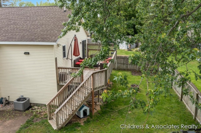 1300 Lancaster Ave NW, Grand Rapids, MI 49504 - fenced backyard featuring a wooden deck and stairs