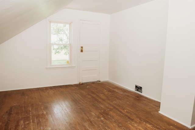 8667 Thompson Hwy, Blissfield, MI 49228 - bonus room featuring hardwood / wood-style floors and vaulted ceiling