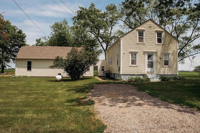 8667 Thompson Hwy, Blissfield, MI 49228 - view of front facade featuring a front lawn