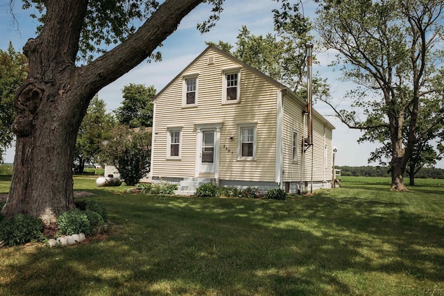 8667 Thompson Hwy, Blissfield, MI 49228 - view of front of house with a front lawn