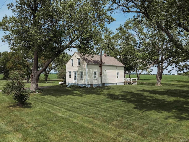 8667 Thompson Hwy, Blissfield, MI 49228 - view of home's exterior featuring a yard