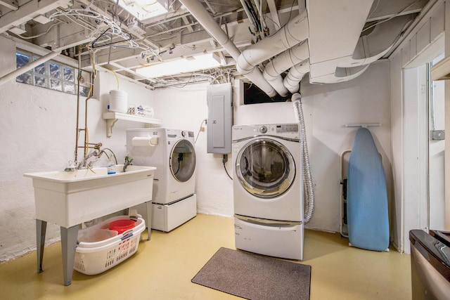 1515 E Stadium Blvd, Ann Arbor, MI 48104 - laundry room featuring electric panel and independent washer and dryer
