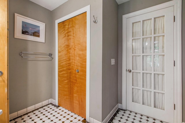 1515 E Stadium Blvd, Ann Arbor, MI 48104 - doorway featuring baseboards and tile patterned floors