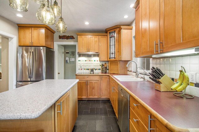 1515 E Stadium Blvd, Ann Arbor, MI 48104 - kitchen with stainless steel appliances, tasteful backsplash, recessed lighting, brown cabinets, and glass insert cabinets