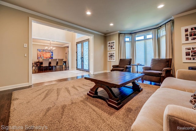 3225 Legacy Ct, West Bloomfield, MI 48323 - living room featuring ornamental molding, wood finished floors, a chandelier, and recessed lighting
