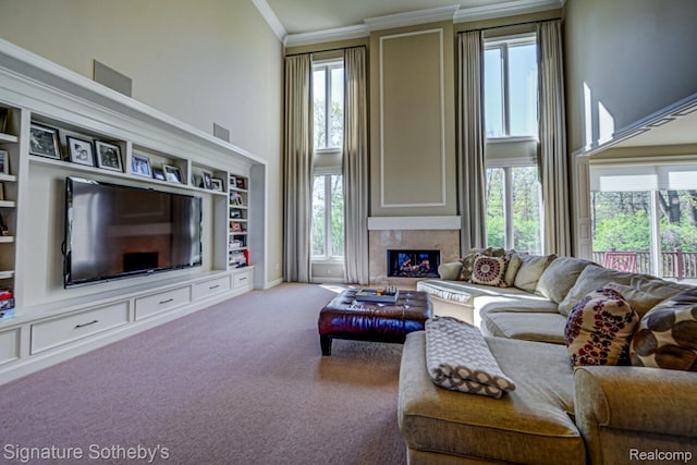3225 Legacy Ct, West Bloomfield, MI 48323 - living room with carpet, crown molding, a premium fireplace, a high ceiling, and built in shelves
