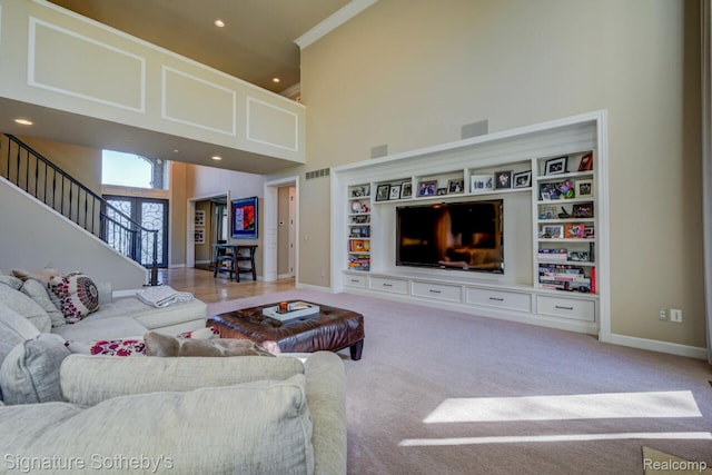 3225 Legacy Ct, West Bloomfield, MI 48323 - carpeted living room featuring a towering ceiling, recessed lighting, and stairway