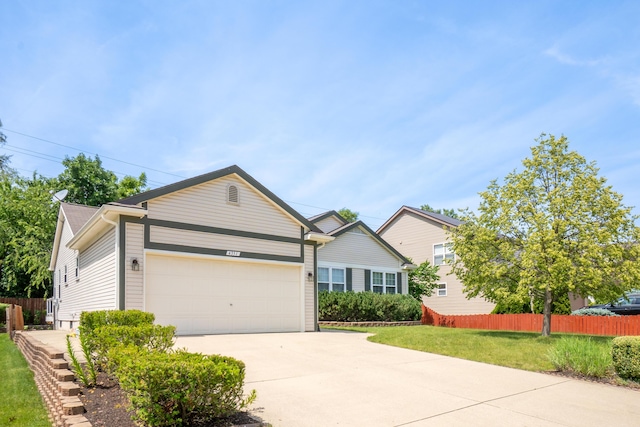 4351 Knollcrest Dr, Ann Arbor, MI 48108 - view of front of home featuring a garage and concrete driveway