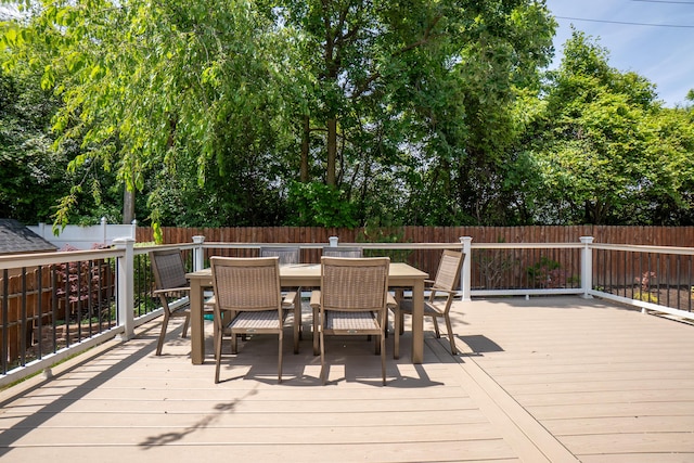 4351 Knollcrest Dr, Ann Arbor, MI 48108 - wooden terrace featuring a fenced backyard and outdoor dining area