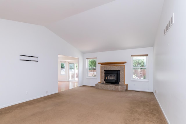 4351 Knollcrest Dr, Ann Arbor, MI 48108 - unfurnished living room featuring healthy amount of natural light, carpet flooring, and high vaulted ceiling