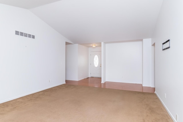 4351 Knollcrest Dr, Ann Arbor, MI 48108 - unfurnished room featuring carpet and lofted ceiling