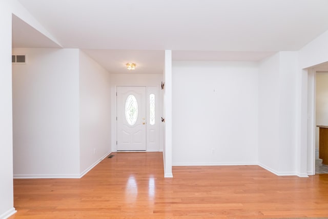 4351 Knollcrest Dr, Ann Arbor, MI 48108 - entrance foyer with light wood-style floors and baseboards