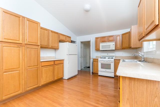 4351 Knollcrest Dr, Ann Arbor, MI 48108 - kitchen featuring white appliances, vaulted ceiling, light countertops, and light wood-style floors